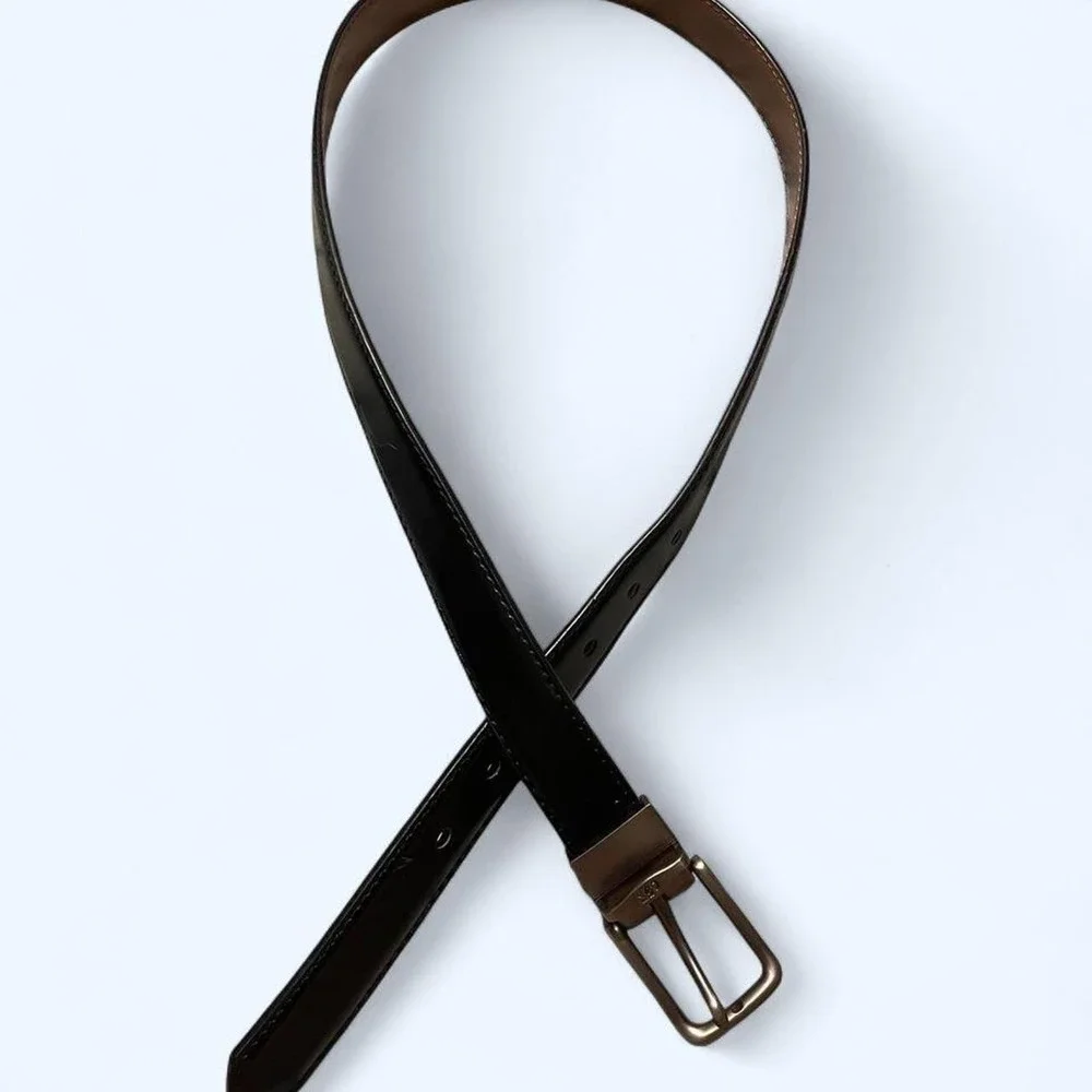 Black leather belt with silver buckle by Kemisant